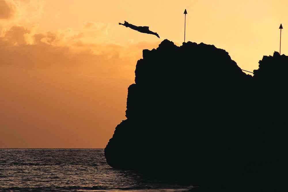 Watching the cliff-diving ceremony at Black Rock is one of the best things to do in Maui at night